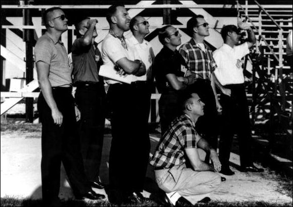 Astronauts watch MA-8 launch