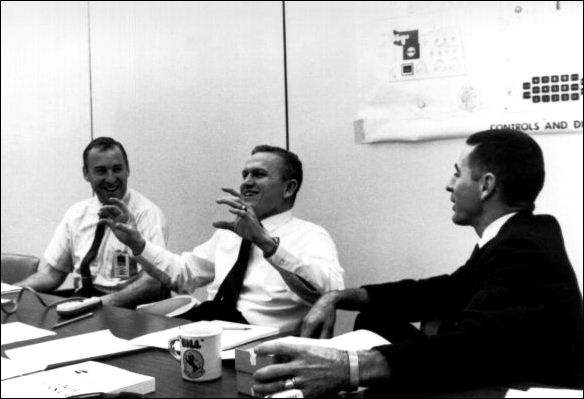 Three jubilant astronauts