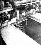 S-IVB tank skins, the basic structural walls of this rocket stage, are milled on the inside in a wafflelike pattern to reduce weight while retaining most of the structural strength