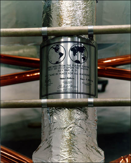Approved by Administrator Paine, here is the Apollo 11 commemorative plaque showing its attached position on the ladder of the landing gear strut on the lunar module descent stage between the third and fourth ladder rungs from the bottom.