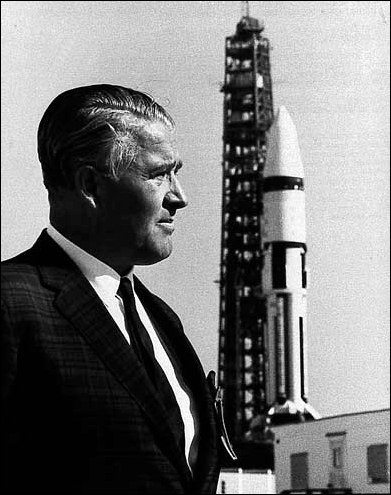 Wernher von Braun stands in front of a Saturn IB Launch Vehicle at Kennedy Space Center (KSC) on January 22, 1968.